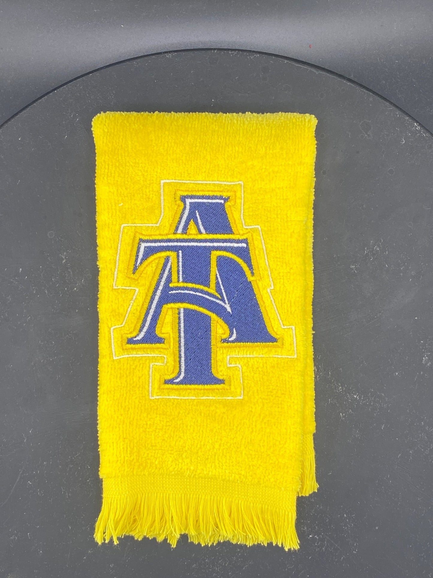 North Carolina A&T Leisure Luxe Towel ā Intertwined A&T Logo - West & Remount Custom Apparel