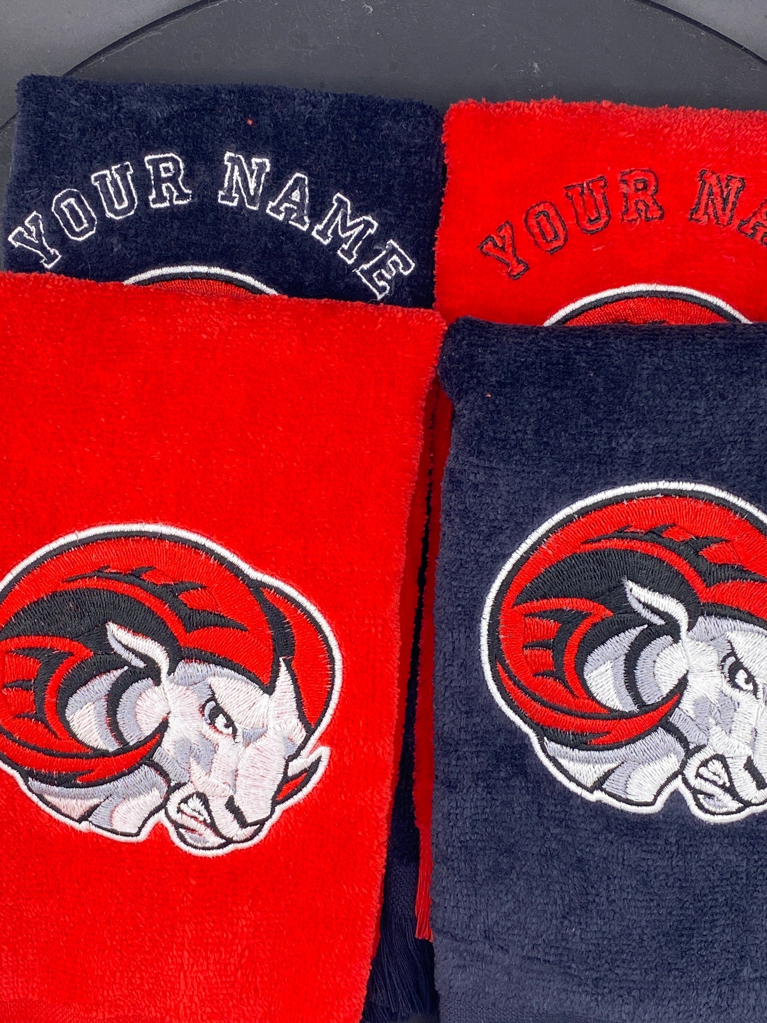 3 Leisure Luxe Towels in black and red representing the Winston-Salem State University - West & Remount Custom Apparel